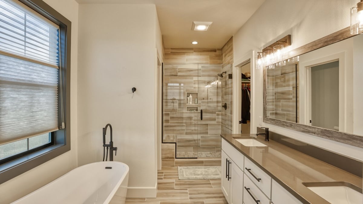 custom bathroom remodel with freestanding tub his and her sinks