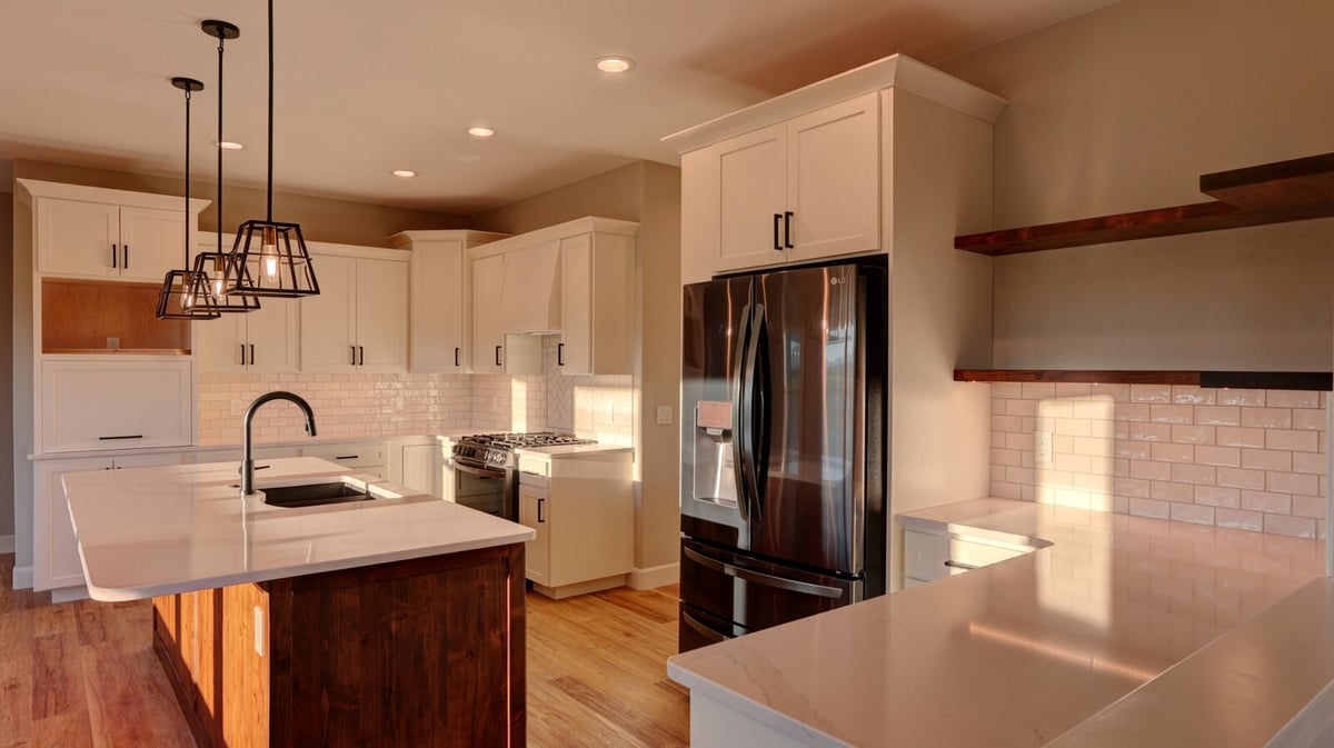 custom kitchen with white coutnertop and white cabinets